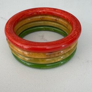 Vintage Set of 4 1950s MCM Rainbow
Bakelite 8" Stacking Unisex  Bracelet Set